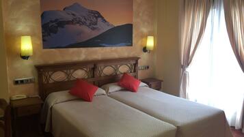 Habitación individual | Minibar, escritorio, wifi gratis y ropa de cama