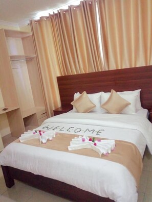 Deluxe Room | Soundproofing, iron/ironing board, free WiFi, bed sheets - Delfirm Hotel (Nairobi)