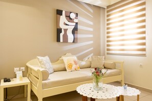 Grand Apartment | Living area | Flat-screen TV