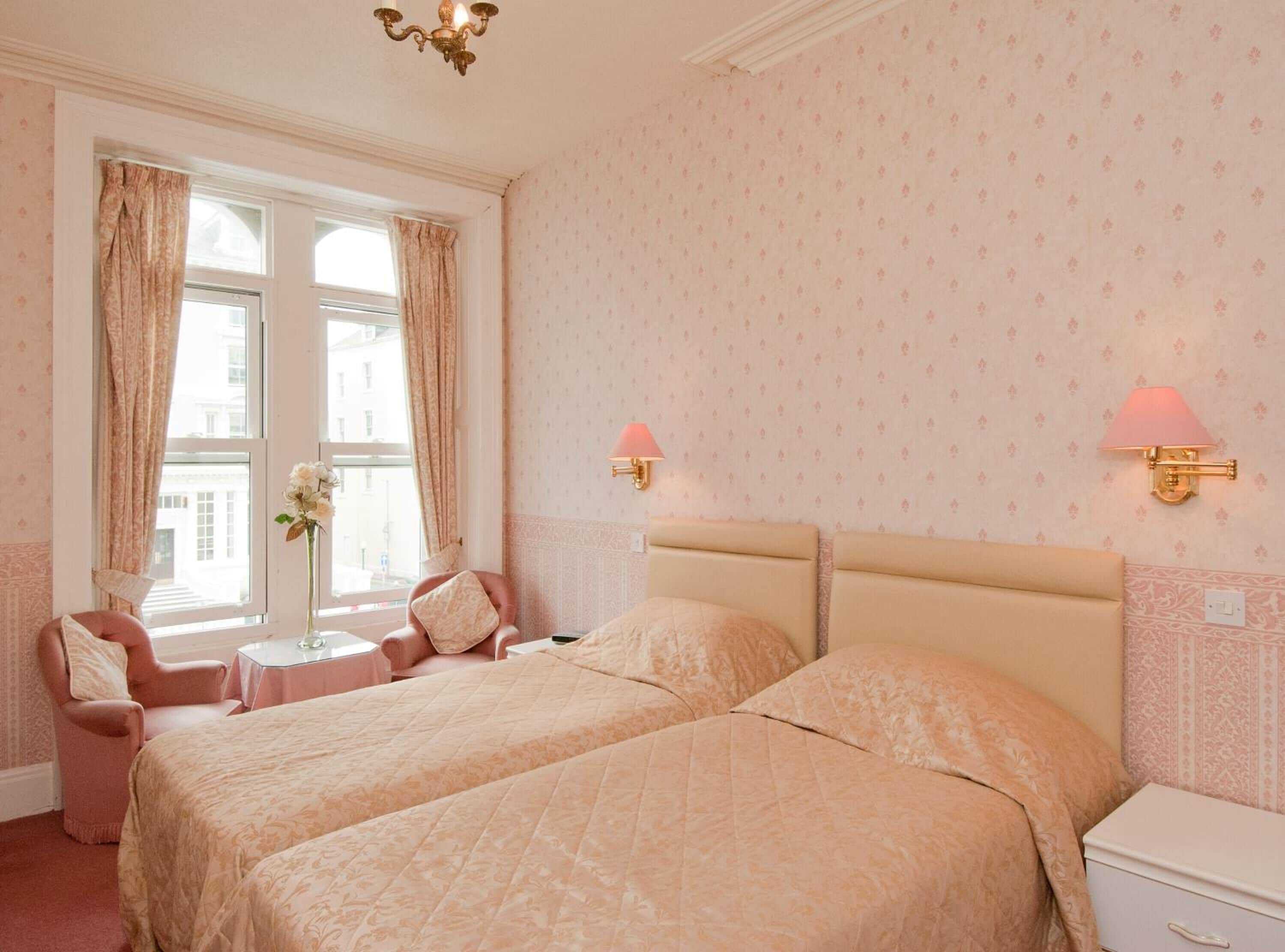 side sea view - twin room | iron/ironing board, bed sheets