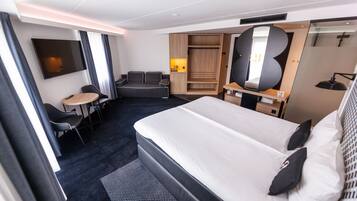 Deluxe suite | Een kluis op de kamer, geluiddichte muren, gratis wifi, beddengoed
