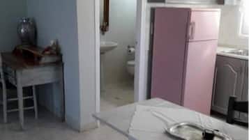 Apartment, 1 Bedroom | Private kitchenette | Full-size fridge, oven, stovetop, coffee/tea maker