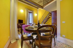 Apartment, 1 Bedroom (Manon Lescaut) | Living area | Flat-screen TV - Appartamento Puccini (Florence)