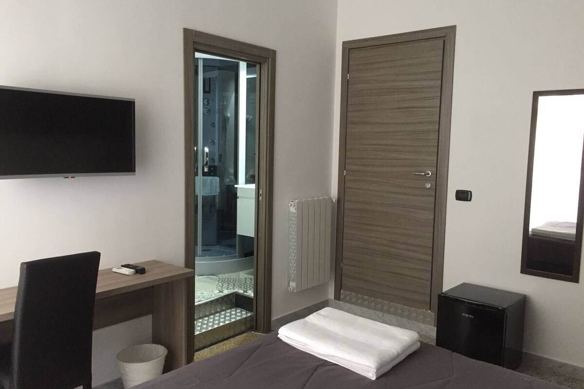 Down comforters, memory foam beds, minibar, in-room safe