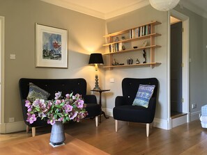 Deluxe-Doppelzimmer, 1 Doppelbett, Nichtraucher, Gartenblick | Wohnzimmer