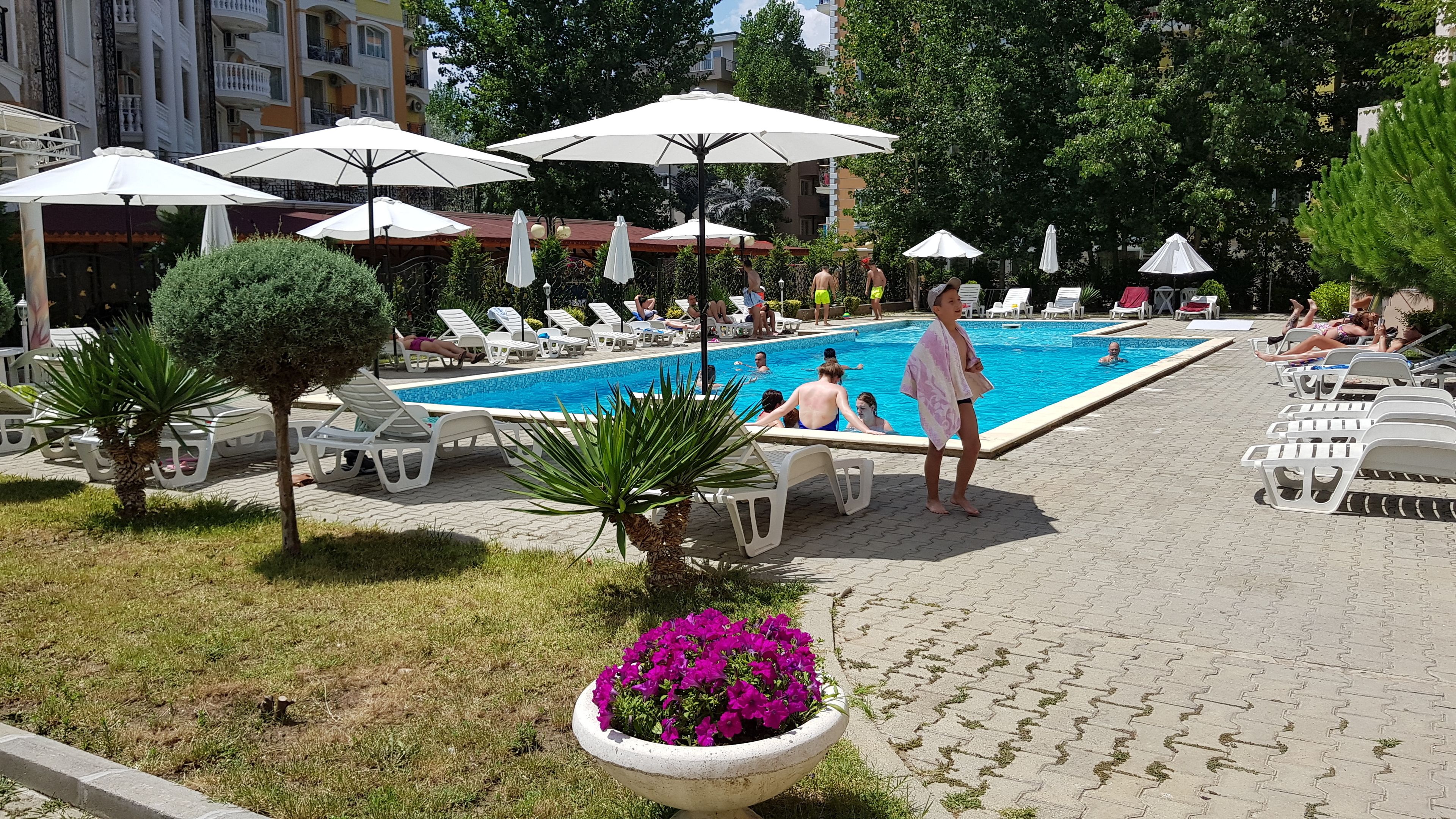 Outdoor pool, open 10:00 AM to 9:00 PM, sun loungers