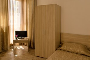 Suite junior, balcón | Camas supletorias y ropa de cama