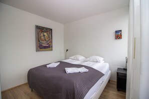 Deluxe Apartment, 1 Bedroom, Ground Floor | 1 bedroom, blackout drapes, cribs/infant beds, free WiFi