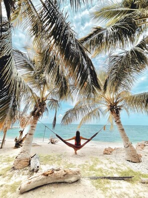 Private beach, white sand, free beach cabanas, sun-loungers
