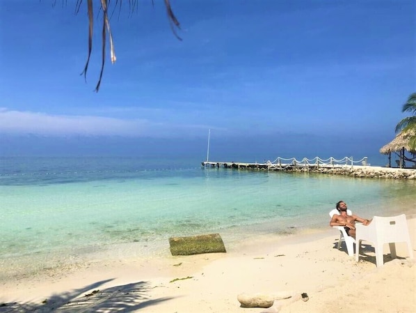 Private beach, white sand, free beach cabanas, sun loungers