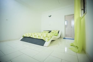 Premium bedding, desk, blackout drapes, iron/ironing board