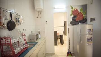 Superior Apartment, 2 Queen Beds, Non Smoking | Private kitchen | Fridge, microwave, oven, stovetop