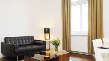 Comfort Apartment | Living area | Flat-screen TV