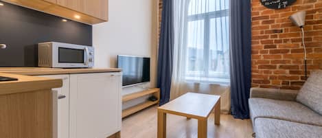 Stay Apartments 14 | Living area | Flat-screen TV