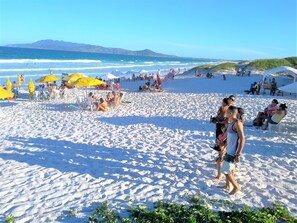 Beach nearby, white sand, sun loungers, beach umbrellas