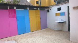 Shower, rainfall showerhead, hair dryer, towels