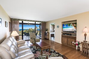 Comfortable living room area leads to a spacious lanai.