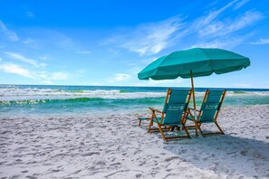 On the beach, sun loungers