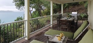 Outdoor dining - COCONUT BREEZE VILLA: MESMERIZING VIEWS, COOLING TRADEWINDS; full A/C; generator (Coral Bay)