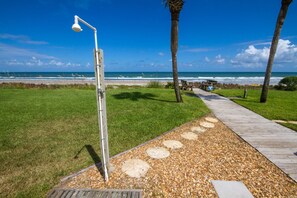 On the beach, sun-loungers, beach towels