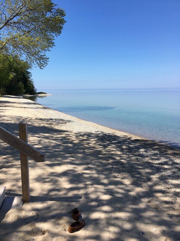 Relax on the beach with a bench and enjoy the tranquil atmosphere.