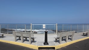 Enjoy the ocean views from the coastal promenade, where benches offer a place to sit and take in the scenery.