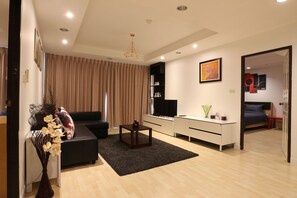 2 chambres, coffres-forts dans les chambres, fer et planche à repasser