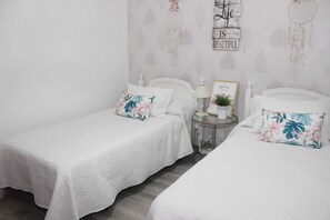 2 bedrooms, desk, iron/ironing board, travel crib
