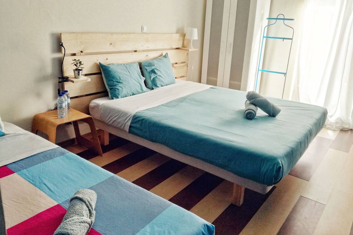 Triple Room | Blackout drapes, cribs (free), WiFi (free), bed sheets