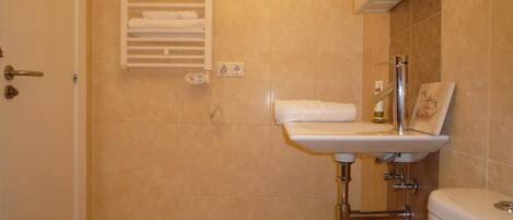 Hair dryer, towels, soap, shampoo