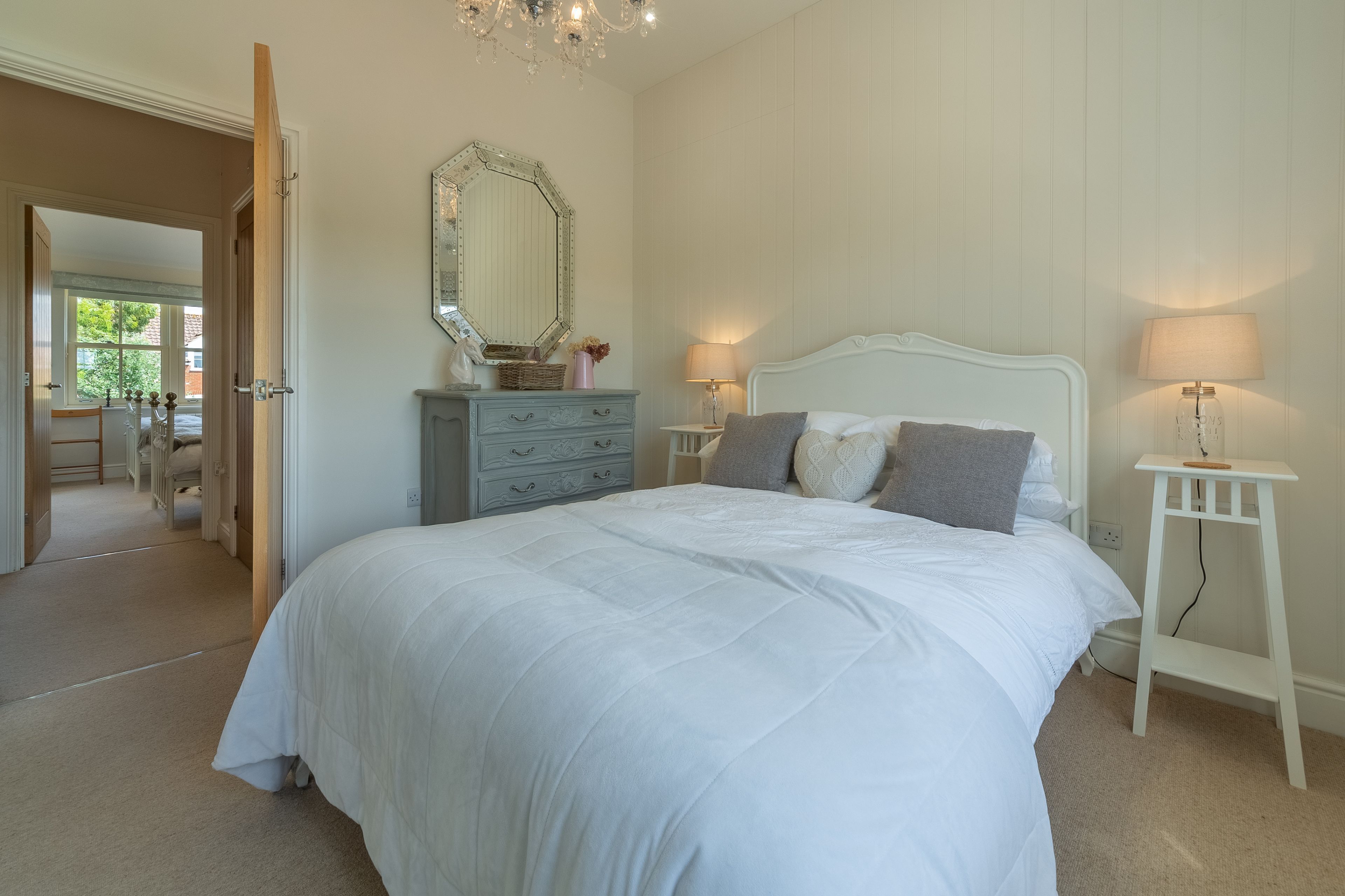 First floor: Master bedroom has a lovely French style bed