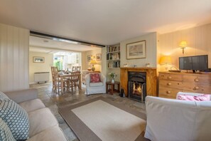TV, fireplace - Marram Cottage, Brancaster Staithe, Norfolk (Brancaster Staithe)