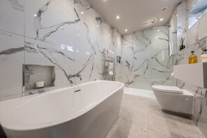 Rainfall showerhead, towels