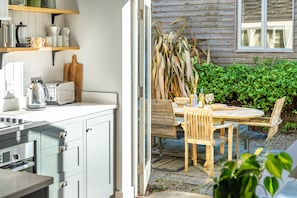 Fridge, microwave, dishwasher, high chair