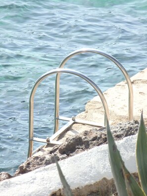 Beach nearby, sun loungers