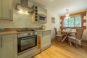 Fridge, microwave, oven, dining tables - The Old Cow Shed, Pott Row, Norfolk (Pott Row)