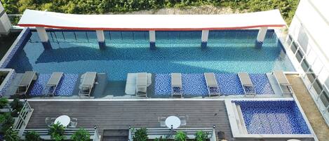 Seasonal outdoor pool, open 8:00 AM to 8:00 PM, sun loungers