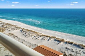 On the beach, sun-loungers, beach towels