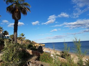 On the beach, sun loungers