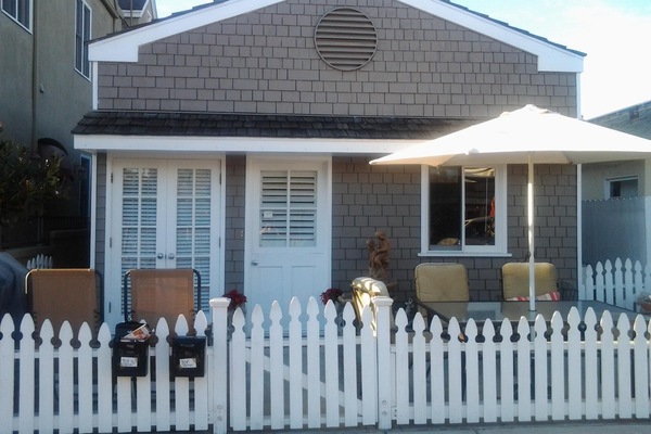 Front of house with large front patio and bbq