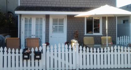 Charming Newport Beach Cottage front house includes middle patio