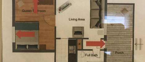 Pianta dell'abitazione con aree indicate: Camera da Letto Matrimoniale, Salotto, Bagno Completo, Cucina e Portico.