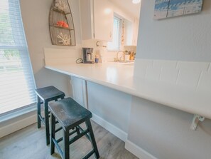 Fridge, microwave, dishwasher, coffee/tea maker