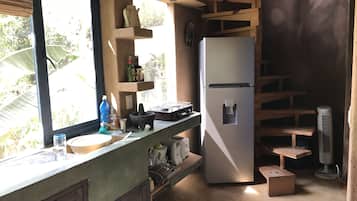 Fridge, coffee/tea maker, toaster, cookware/dishes/utensils