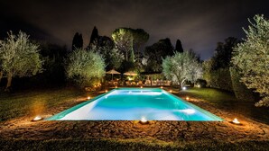 A swimming pool surrounded by trees and a gazebo with outdoor seating. - Exclusive 7BR-8BA Villa with pool, a few mins from town, yet in the countryside (Impruneta)