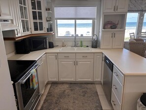 Fridge, microwave, oven, stovetop - Gorgeous Ocean Front Beach Home. Easy stroll to Restaurants and Night Life. (New Smyrna Beach)