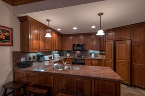 Fridge, microwave, oven, stovetop - Luxurious condo next to the lifts, 2 master bedrooms, free wifi, & parking. (Copper Mountain)