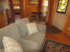 TV, fireplace -  Romantic Pet  Log Cabin with hot tub, waterfall, wifi, gas grill, firepit creek (Hot Springs)