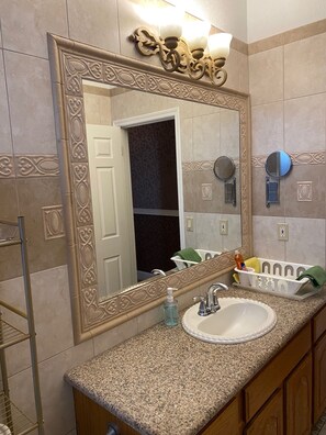 Combined shower/bathtub, hair dryer, towels, soap