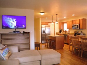 Open living room into kitchen.